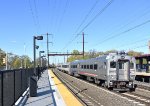 Westbound NJ Transit Train # 3947 bypassing the depot with Comet V Cab Car # 6004 on the point 